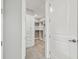 Well-organized walk-in closet featuring custom shelving, drawers, and ample storage space at 5670 Shorebird Br, Land O Lakes, FL 34638