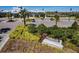 Meridian at Watermarke community clubhouse with parking lot and sign surrounded by lush landscaping at 5670 Shorebird Br, Land O Lakes, FL 34638