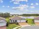 Beautiful single-Gathering home featuring a three-car garage and a serene lake view at 5670 Shorebird Br, Land O Lakes, FL 34638