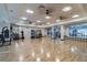Spacious stretching room with wood floor, mirrors, and equipment at 5670 Shorebird Br, Land O Lakes, FL 34638