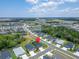 An aerial view of a community featuring single-Gathering homes, ponds, and green spaces at 5828 Clairwood Ct, Palmetto, FL 34221