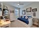 Spare bedroom with a daybed, desk and decorative accessories at 5828 Clairwood Ct, Palmetto, FL 34221