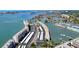 An aerial view showcases the complex's waterfront location and the parking and boat docks at 5925 Shore S Blvd # 602, Gulfport, FL 33707