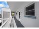 Hallway view showing unit door number 602 and updated features and decor throughout the building at 5925 Shore S Blvd # 602, Gulfport, FL 33707