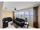 Waterfront living room with sweeping views, comfortable seating, and lots of natural light at 5925 Shore S Blvd # 602, Gulfport, FL 33707