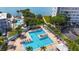 Aerial view showcasing the community pool area with landscaping and lounge areas at 5925 Shore S Blvd # 602, Gulfport, FL 33707