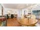 Spacious living area with hardwood floors, stylish furnishings, and an open layout at 611 Bannockburn Ave, Temple Terrace, FL 33617