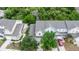 Aerial view of neighborhood showcasing houses with mature trees at 6233 Olivedale Dr, Riverview, FL 33578