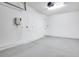 Spacious garage interior with ample room for parking and storage at 6233 Olivedale Dr, Riverview, FL 33578