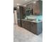 Well-equipped kitchen featuring sleek cabinetry, granite countertops, and stainless steel appliances at 627 E Davis Blvd, Tampa, FL 33606