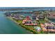 Scenic aerial view of a waterfront property showcasing lush landscaping and stunning water views at 6295 Bahia Del Mar Cir # 406, St Petersburg, FL 33715