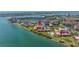Breathtaking aerial view showcasing a waterfront property with lush greenery and bay views at 6295 Bahia Del Mar Cir # 406, St Petersburg, FL 33715