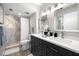 Bathroom with double sinks, marble shower, and a clean, modern aesthetic at 6295 Bahia Del Mar Cir # 406, St Petersburg, FL 33715