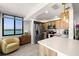 Bright kitchen with stainless steel appliances, wood cabinets, and a view of the water at 6295 Bahia Del Mar Cir # 406, St Petersburg, FL 33715