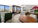 Well-lit living space with modern furnishings, large windows, and scenic outdoor views at 6295 Bahia Del Mar Cir # 406, St Petersburg, FL 33715