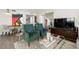 Living room with plush seating, a glass table, and modern decor at 6295 Bahia Del Mar Cir # 406, St Petersburg, FL 33715