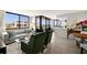 Inviting living area with modern furnishings, large windows, and balcony access showcasing views at 6295 Bahia Del Mar Cir # 406, St Petersburg, FL 33715