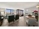 Bright living room featuring a spacious layout, modern decor, and access to a private balcony at 6295 Bahia Del Mar Cir # 406, St Petersburg, FL 33715