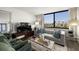 Cozy living room with ample seating, stylish accents, and a view of the outdoors at 6295 Bahia Del Mar Cir # 406, St Petersburg, FL 33715