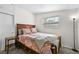 Comfortable bedroom showcasing wood furniture and natural light at 6415 13Th N Ave, St Petersburg, FL 33710