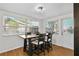 Cozy breakfast nook bathed in natural light, complemented by a modern table and chairs at 6415 13Th N Ave, St Petersburg, FL 33710