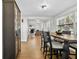 Open-concept dining room with modern decor and hardwood floors at 6415 13Th N Ave, St Petersburg, FL 33710