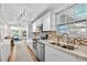 Contemporary kitchen boasts stainless steel appliances and ample counter space at 6415 13Th N Ave, St Petersburg, FL 33710