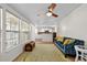 Bright living room featuring hardwood floors and an open floor plan concept into the kitchen at 6415 13Th N Ave, St Petersburg, FL 33710