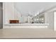 Open-concept layout with a view to the living room from behind the countertop at 6415 13Th N Ave, St Petersburg, FL 33710