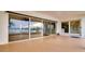 Spacious covered tile patio provides open water views at 6442 Lake Sunrise Dr, Apollo Beach, FL 33572