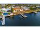 Waterfront home featuring a dock and expansive water views, perfect for enjoying the Florida lifestyle at 6442 Lake Sunrise Dr, Apollo Beach, FL 33572