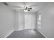 Bedroom with neutral paint, carpet, and a ceiling fan at 7031 Kendall Heath Way, Land O Lakes, FL 34637