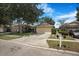 Charming single Gathering home with a well-maintained lawn and inviting curb appeal at 7031 Kendall Heath Way, Land O Lakes, FL 34637