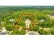 An aerial view of a property with distinct boundary lines showcasing its expansive lot at 7340 West Dr, Wesley Chapel, FL 33544