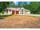 Lovely one story home with columns, an arched entryway and a two car garage at 7340 West Dr, Wesley Chapel, FL 33544