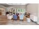 Inviting living room featuring stylish furniture, hardwood floors, and natural light streaming through the windows at 7340 West Dr, Wesley Chapel, FL 33544