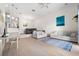 Open-concept living area featuring sleek wood floors, comfortable seating, and stylish lighting at 736 Coral Reef Dr, Tampa, FL 33602