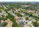 Overhead view of a neighborhood with a scenic waterway, displaying a mix of homes and lush greenery, very picturesque at 7657 Nottinghill Sky Dr, Apollo Beach, FL 33572