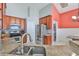 Updated kitchen with stainless steel appliances and granite countertops at 7657 Nottinghill Sky Dr, Apollo Beach, FL 33572