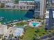 Aerial view of pool and boat docks offering recreational opportunities for residents at 7665 Sun Island S Dr # 307, South Pasadena, FL 33707