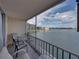 Balcony showcasing seating and picturesque waterfront views at 7665 Sun Island S Dr # 307, South Pasadena, FL 33707