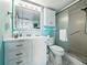 Bathroom with walk-in shower, vanity and tile floor at 7665 Sun Island S Dr # 307, South Pasadena, FL 33707