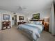 Bedroom with water views, ensuite bathroom and adjoining office at 7665 Sun Island S Dr # 307, South Pasadena, FL 33707