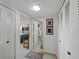 Hallway with view to the bedroom and bathroom and closet space at 7665 Sun Island S Dr # 307, South Pasadena, FL 33707