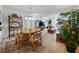 Spacious living room featuring a dining area and expansive layout, perfect for entertaining and relaxation at 7665 Sun Island S Dr # 307, South Pasadena, FL 33707