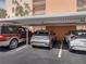 Designated covered parking spaces offering protection from the elements for residents and guests at 7665 Sun Island S Dr # 307, South Pasadena, FL 33707