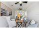 Well-lit home office provides an ideal workspace with a decorative lamp at 7991 1St S Ave, St Petersburg, FL 33707