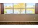 Tranquil water view framed by a large window, offering a serene backdrop at 810 Bluewater Dr, Sun City Center, FL 33573