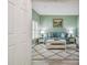 Cozy living room featuring a comfortable sofa and stylish decor at 8320 Bluevine Sky Dr, Land O Lakes, FL 34637