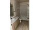 A full bathroom featuring a single sink vanity, medicine cabinet, and a tub-shower combo at 8517 Island Breeze Ln # 106, Temple Terrace, FL 33637